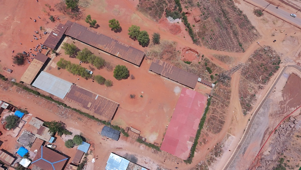 Body_Aerial-view-of-the-Galaxy-School-located-next-to-the-mining-area_Source-Int.jpg